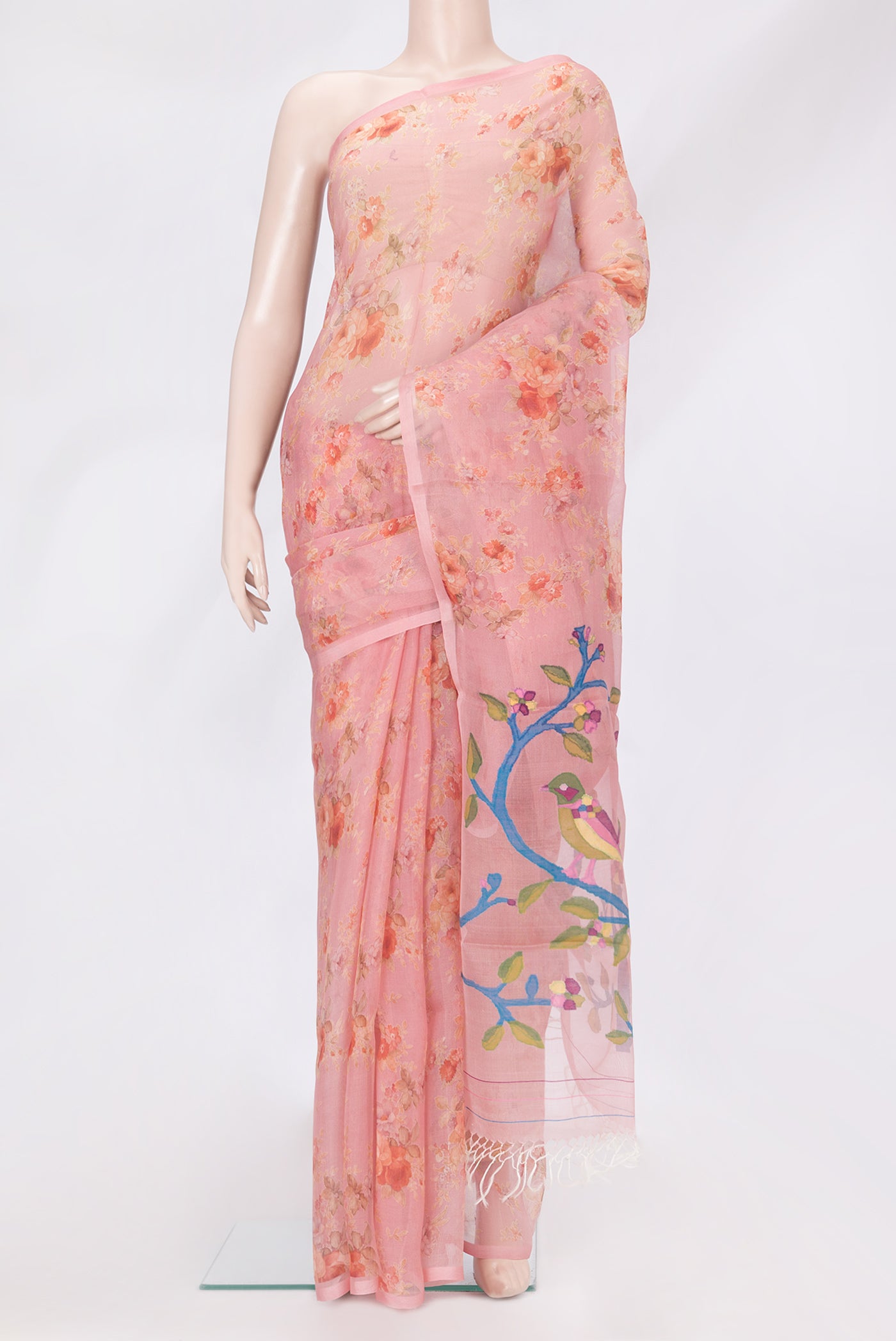 Pink Organza Silk Saree with Floral Print on the body and Without Border.  displayed on a mannequin
