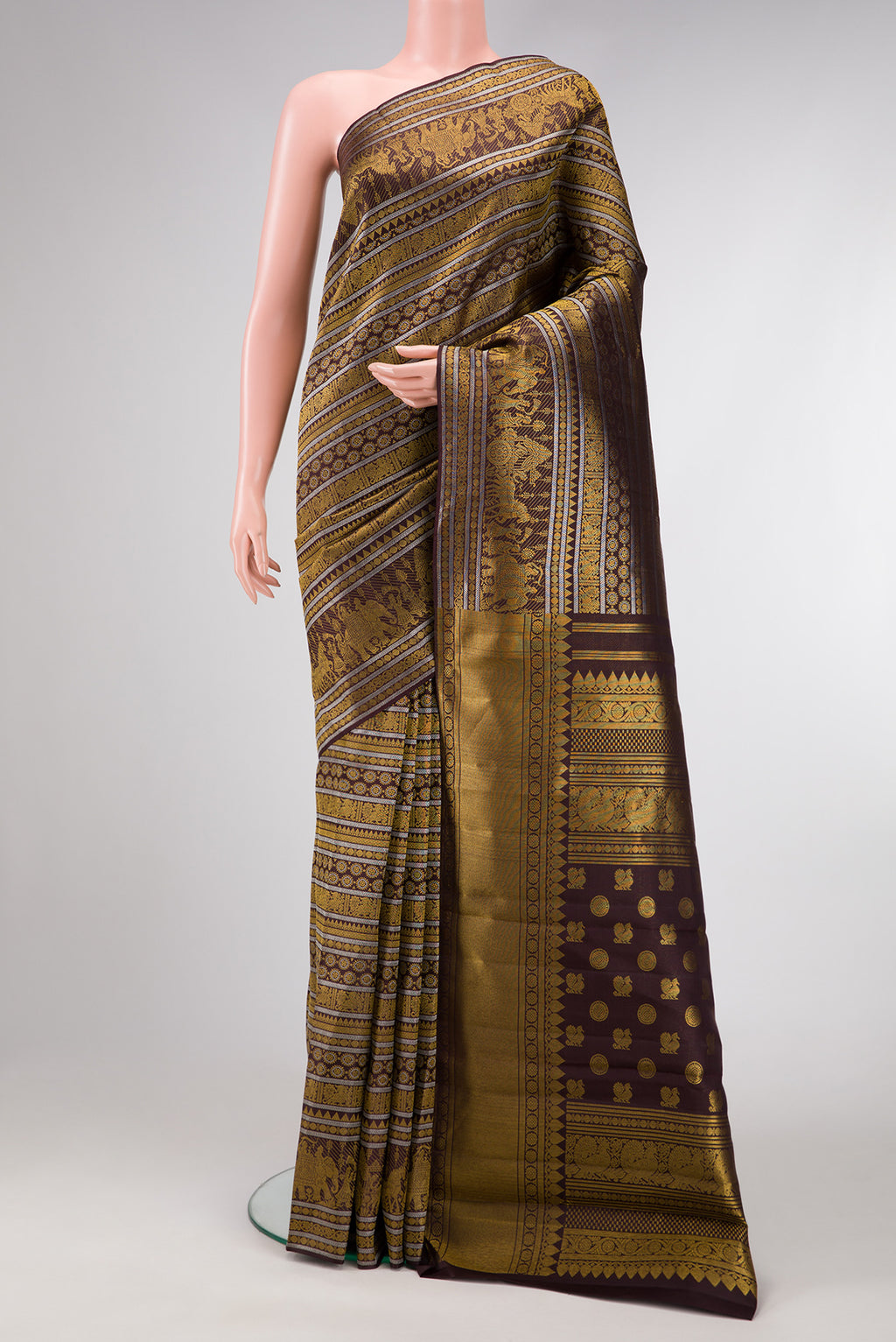 Coffee Brown Dual Tone Kanchipuram Silk Saree with Zari Brocade on the body and Fancy Border.  displayed on a mannequin