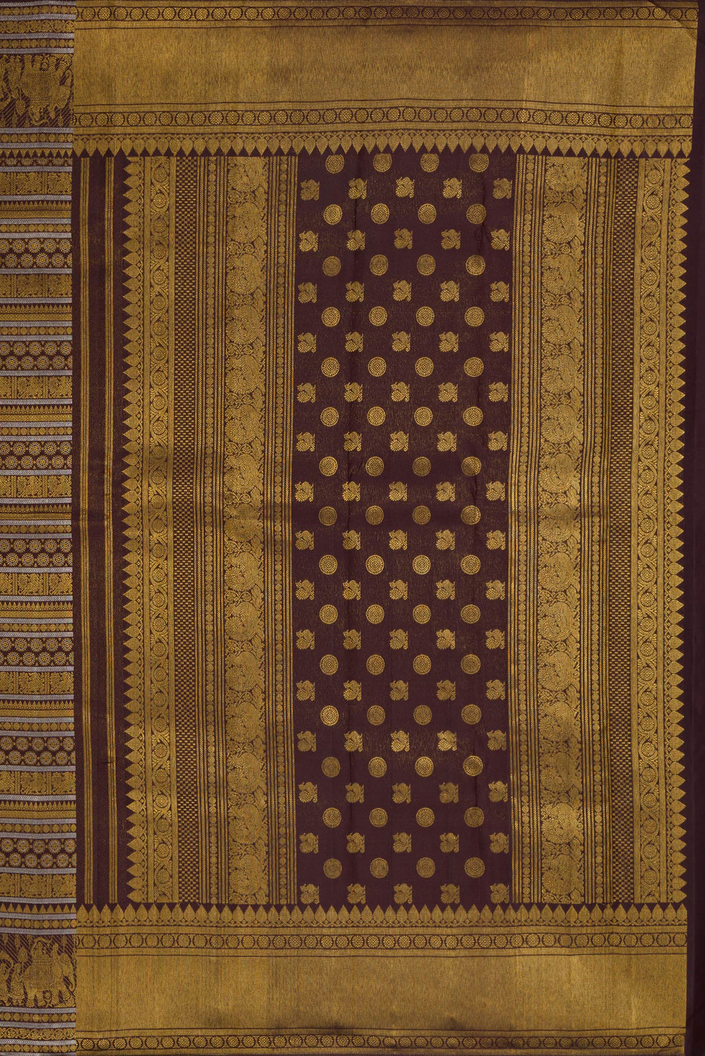 Close up image of the pallu of Coffee Brown Dual Tone Kanchipuram Silk Saree with Zari Brocade on the body and Fancy Border. 