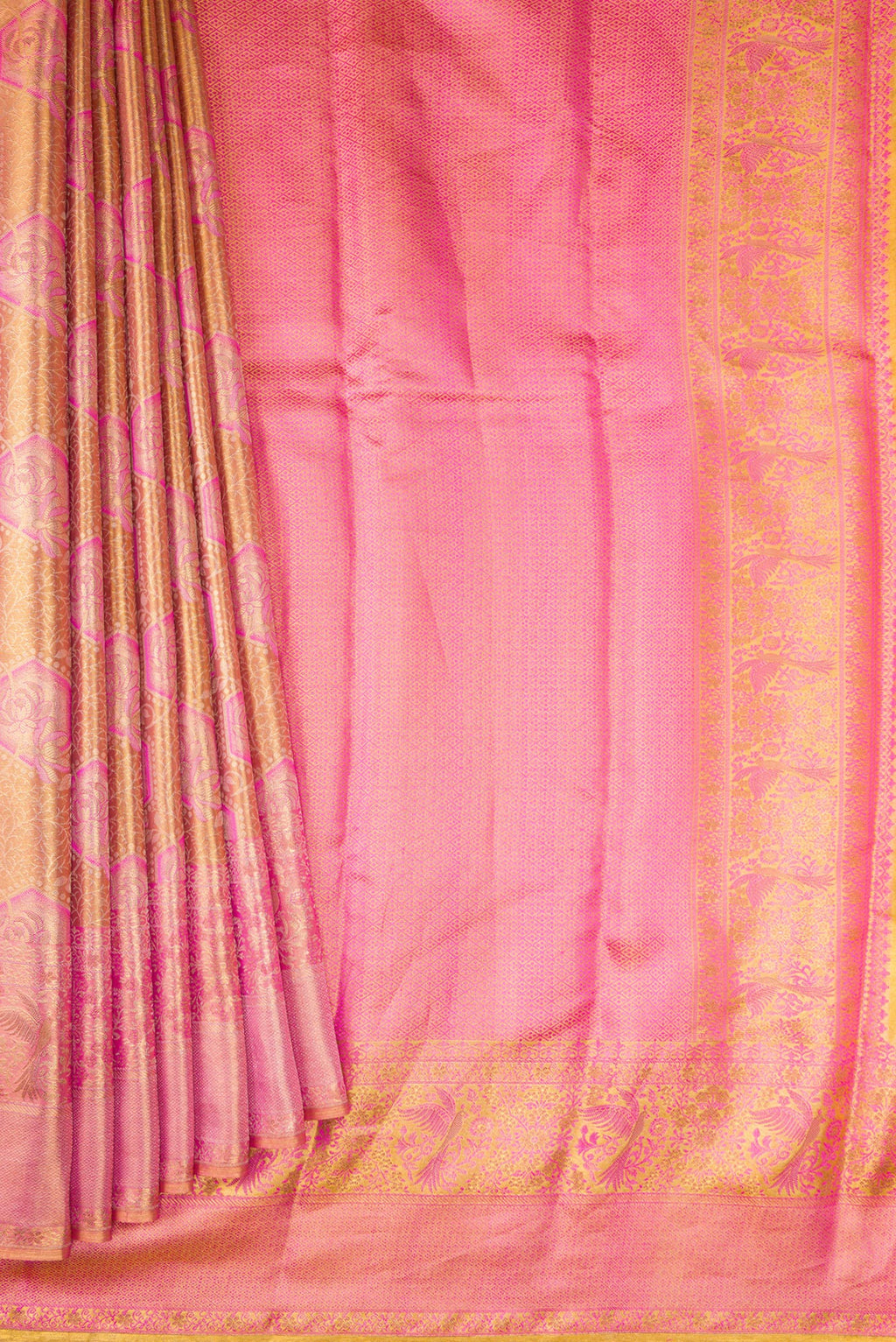 Pleats and pallu of Peach Dual Tone Kanchipuram Tissue Silk Saree with Zari Brocade on the body and Fancy Border. 