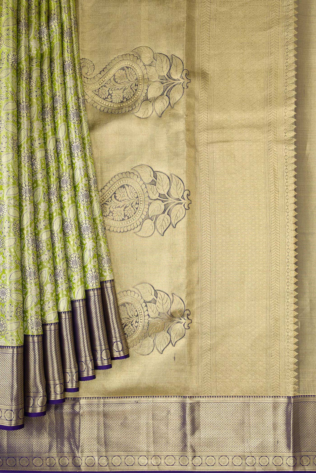 Pleats and pallu of Pista Green Dual Tone Kanchipuram Tissue Silk Saree with Zari Brocade on the body and Zari Border. 