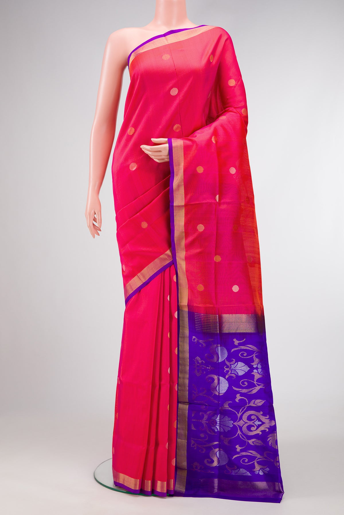 Dark Pink Dual Tone Uppada Silk Saree with Zari Butta on the body and Zari Border.  displayed on a mannequin