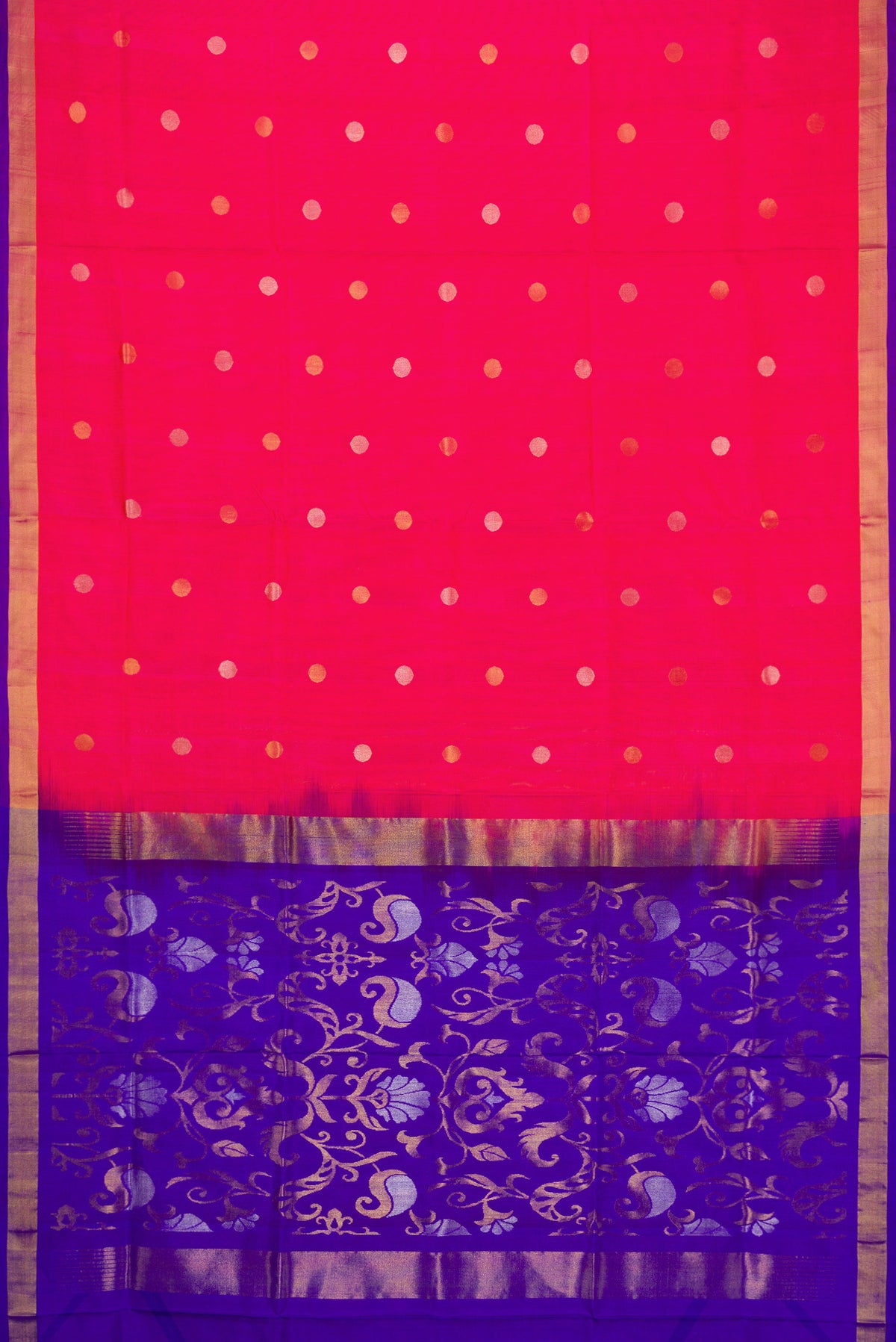 Flat view of Dark Pink Dual Tone Uppada Silk Saree with Zari Butta on the body and Zari Border. 