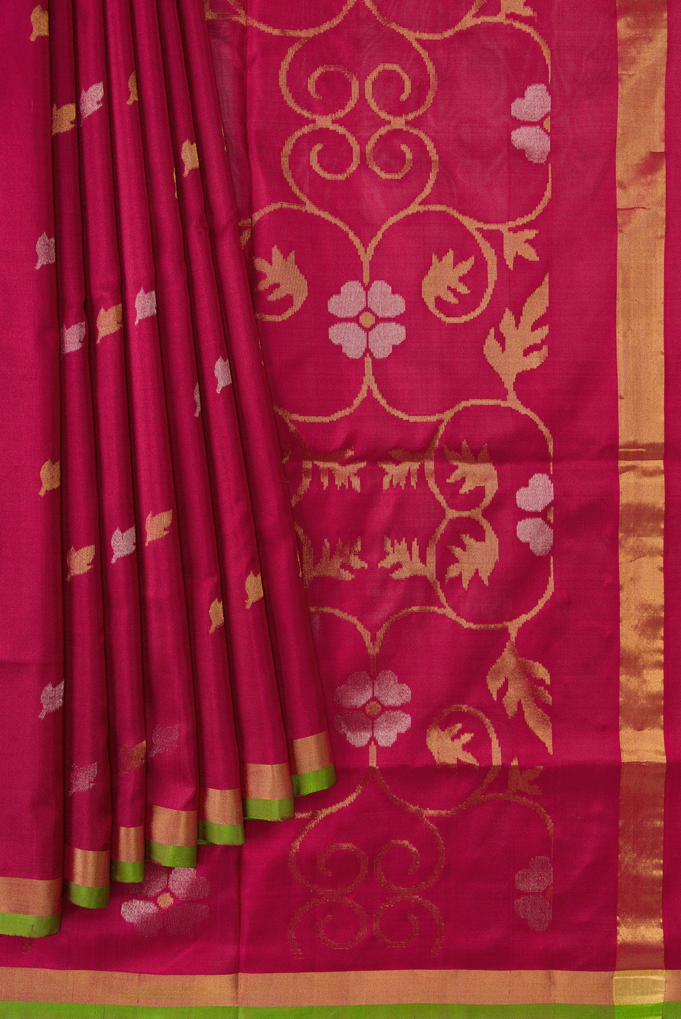 Pleats and pallu of Dark Mauve Dual Tone Uppada Silk Saree with Zari Butta on the body and Zari Border. 