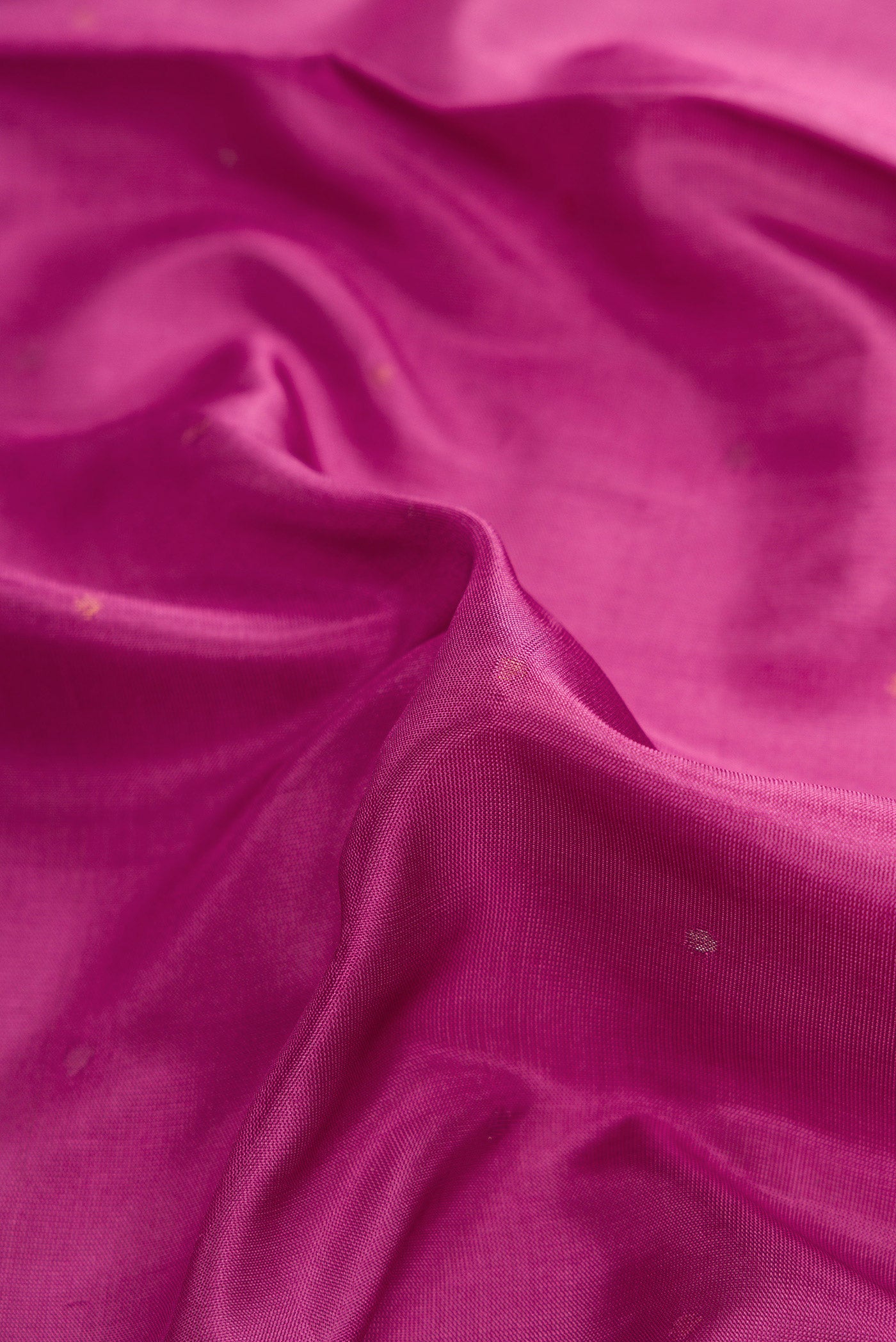 Close up of Lavender Dual Tone Uppada Silk Saree with Zari Butta on the body and Zari Border.  displaying folds