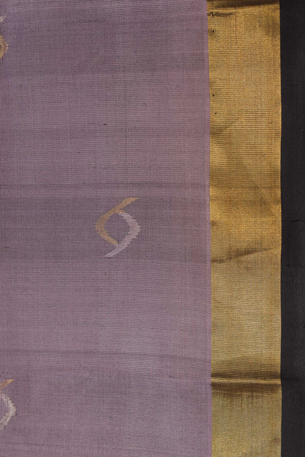 Border image of Lavender Dual Tone Soft Silk Saree with Zari Butta on the body and Zari Border. 