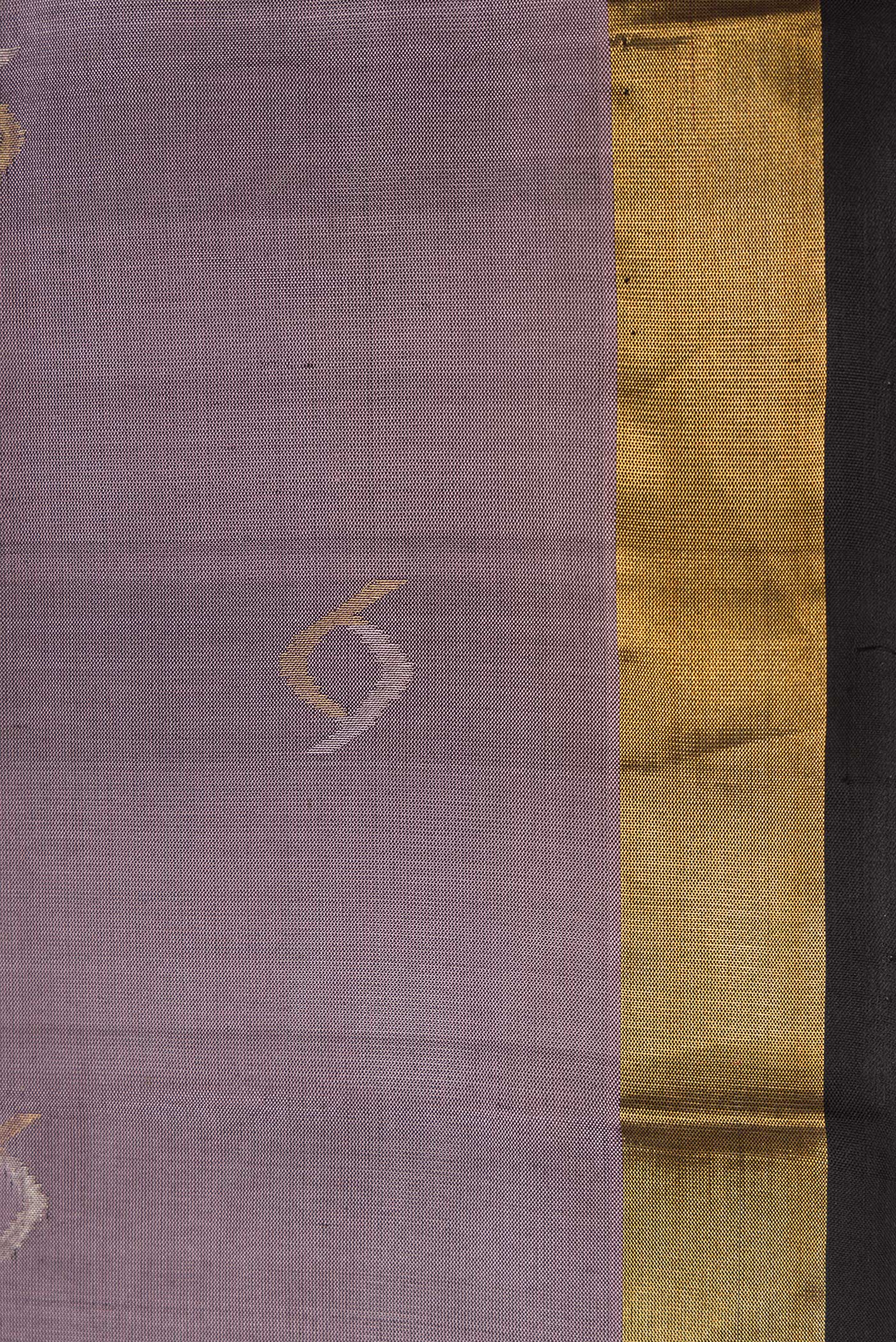Border image of Lavender Dual Tone Soft Silk Saree with Zari Butta on the body and Zari Border. 