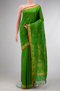 Green Dual Tone Soft Silk Saree with Zari Butta on the body and Zari Border.  displayed on a mannequin