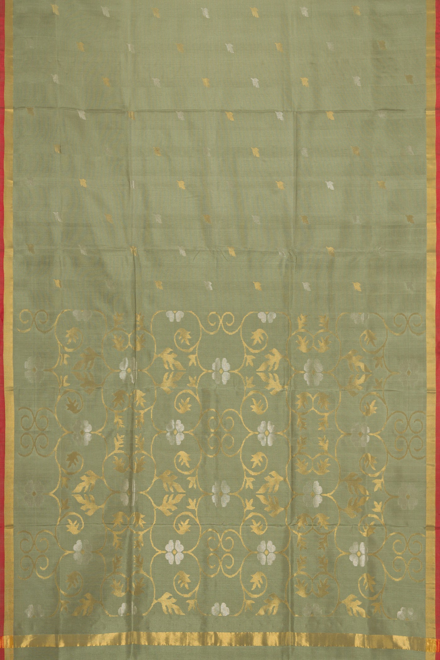 Flat view of Light Green Dual Tone Soft Silk Saree with Zari Butta on the body and Zari Border. 