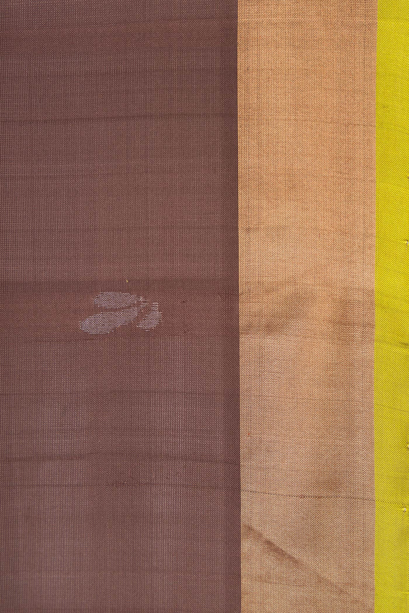 Border image of Brown Dual Tone Soft Silk Saree with Zari Butta on the body and Zari Border. 