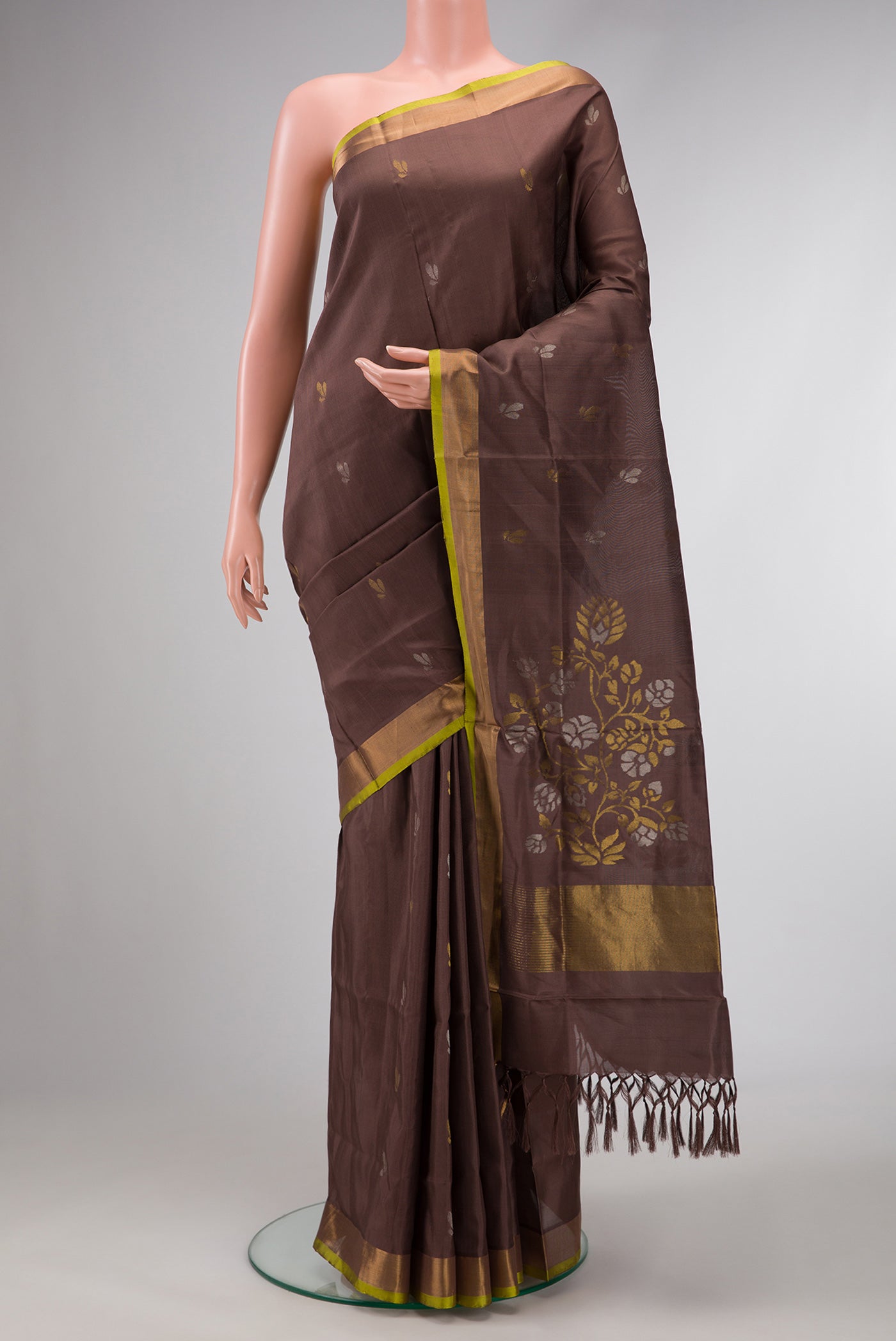 Brown Dual Tone Soft Silk Saree with Zari Butta on the body and Zari Border.  displayed on a mannequin