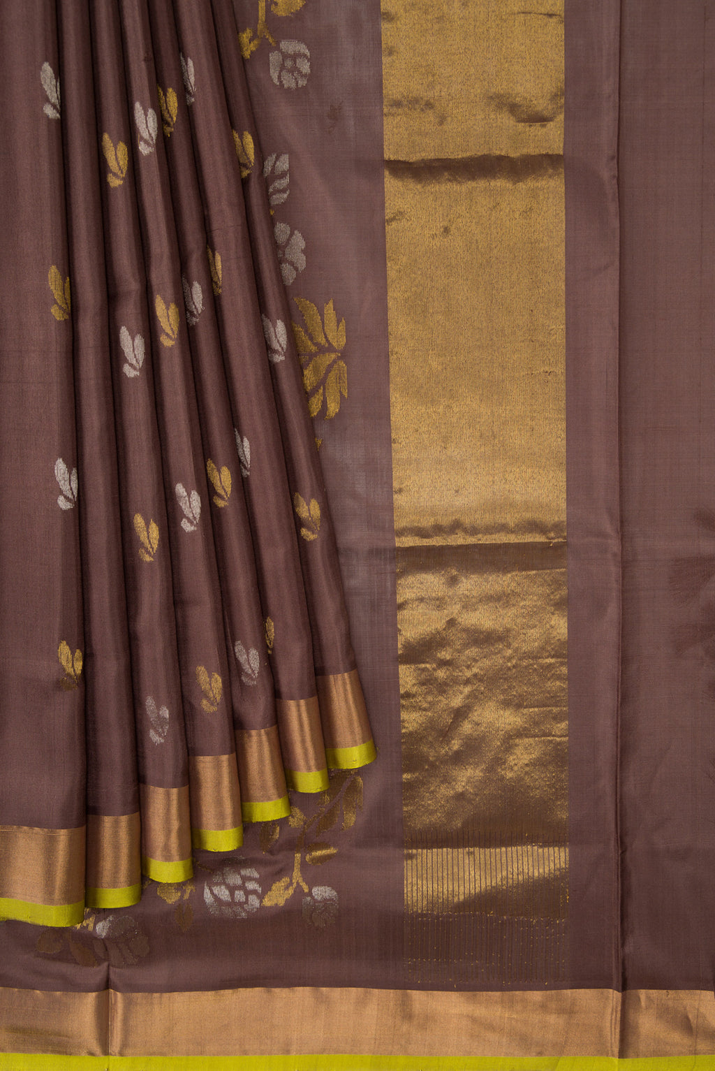 Pleats and pallu of Brown Dual Tone Soft Silk Saree with Zari Butta on the body and Zari Border. 