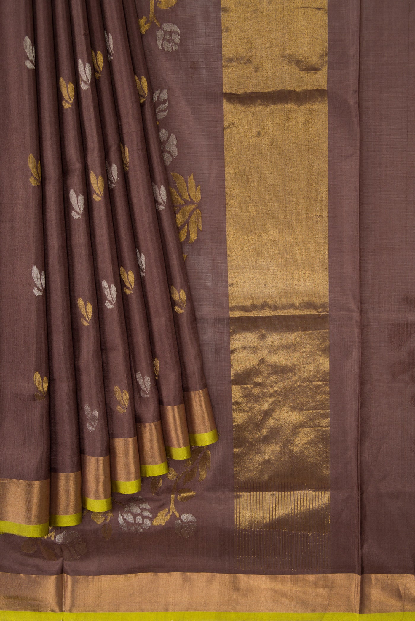 Pleats and pallu of Brown Dual Tone Soft Silk Saree with Zari Butta on the body and Zari Border. 