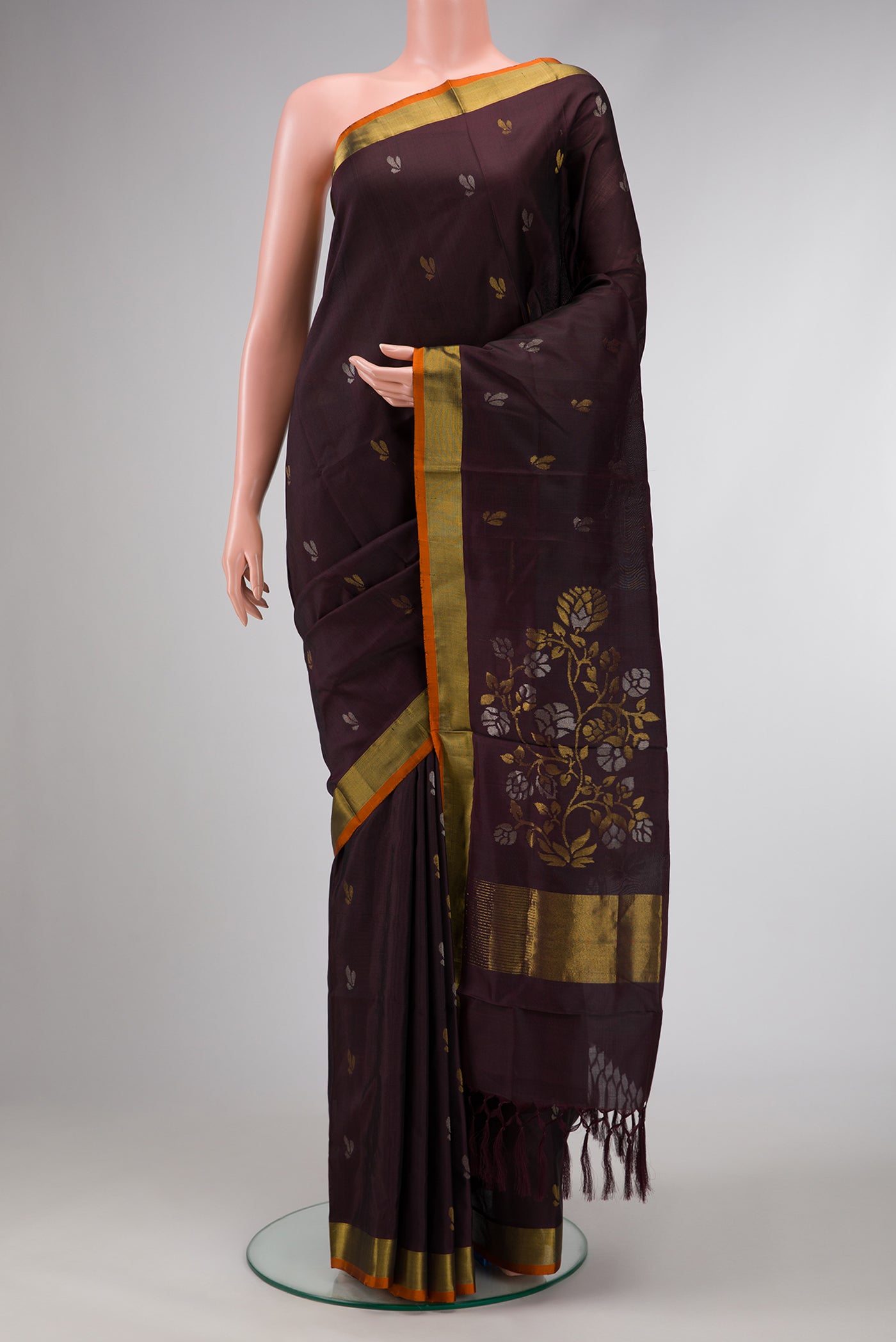 Coffee Brown Dual Tone Soft Silk Saree with Zari Butta on the body and Zari Border.  displayed on a mannequin