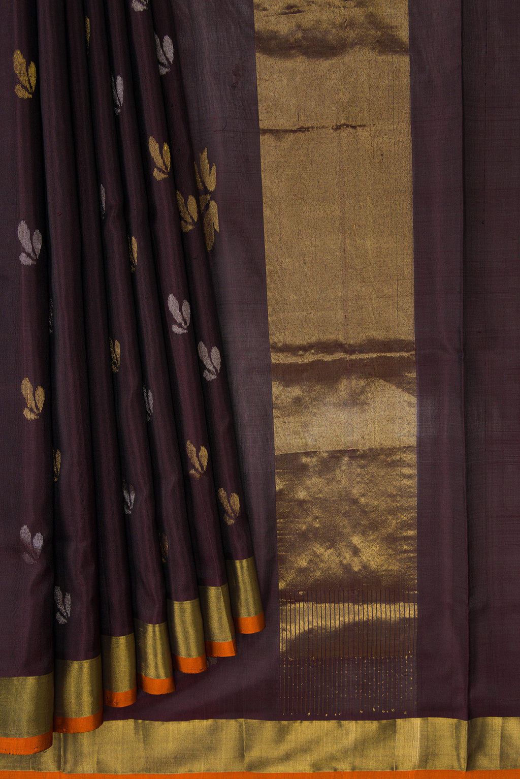 Pleats and pallu of Coffee Brown Dual Tone Soft Silk Saree with Zari Butta on the body and Zari Border. 