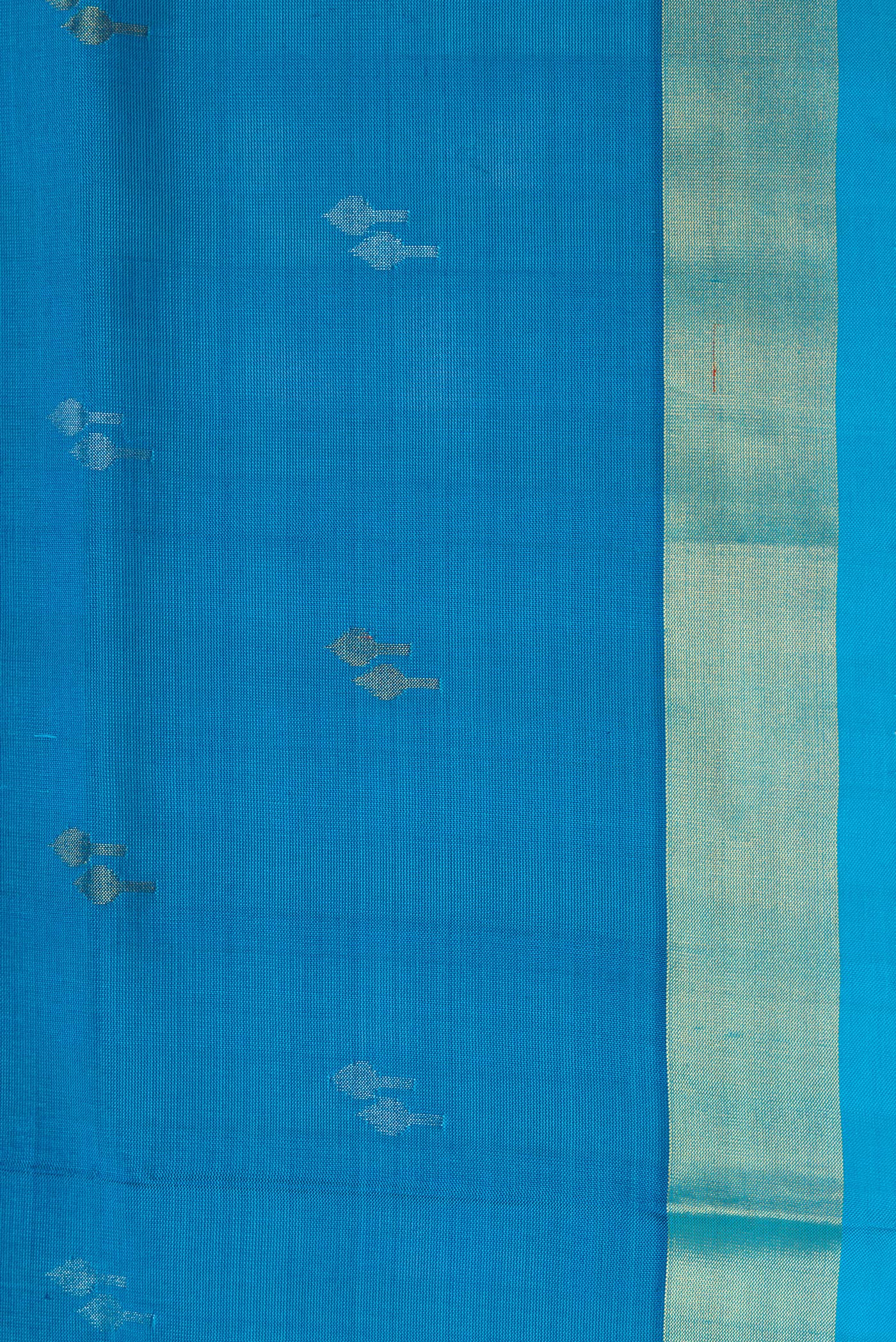 Border image of Sky Blue Dual Tone Soft Silk Saree with Zari Butta on the body and Zari Border. 