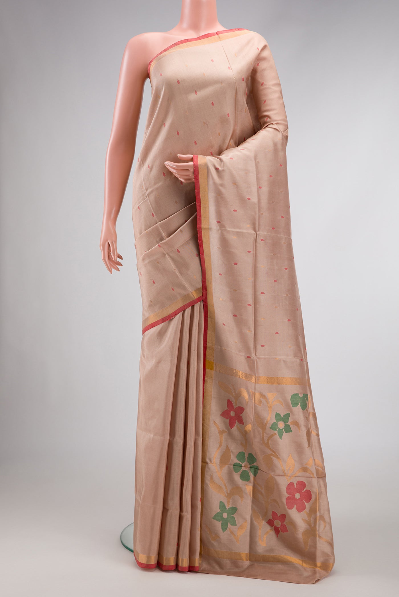 Dark Beige Dual Tone Uppada Silk Saree with Zari And Thread Butta on the body and Zari Border.  displayed on a mannequin