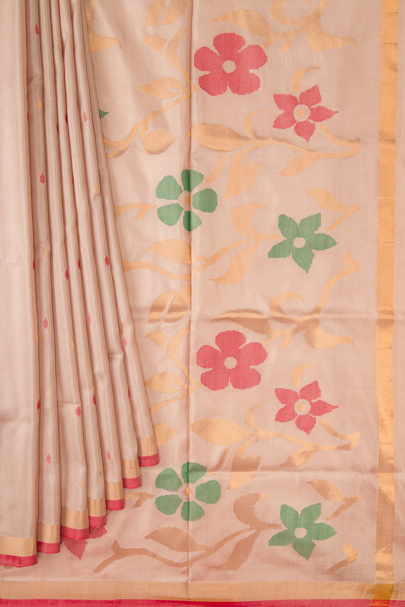 Pleats and pallu of Dark Beige Dual Tone Uppada Silk Saree with Zari And Thread Butta on the body and Zari Border. 