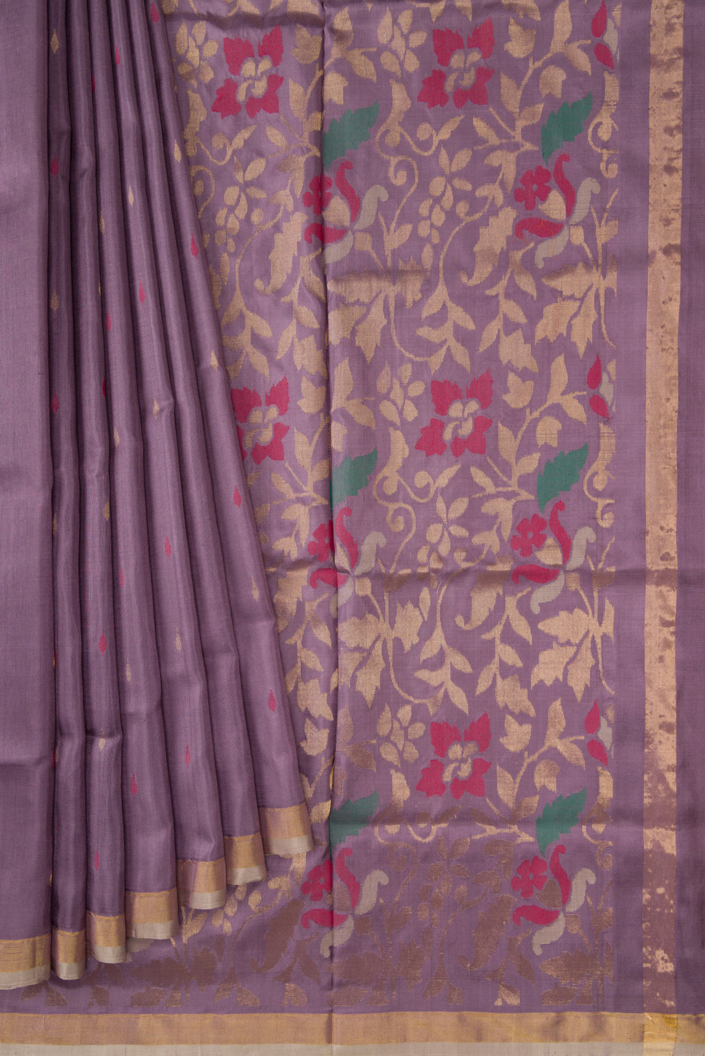 Pleats and pallu of Purple Dual Tone Uppada Silk Saree with Zari And Thread Butta on the body and Zari Border. 