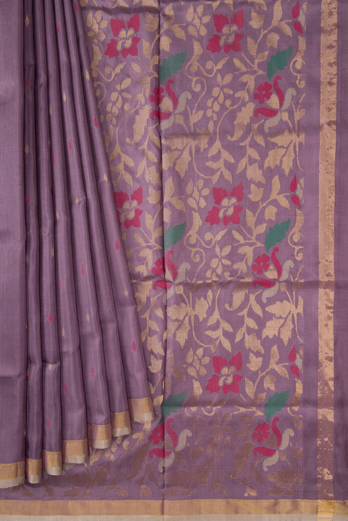 Pleats and pallu of Purple Dual Tone Uppada Silk Saree with Zari And Thread Butta on the body and Zari Border. 