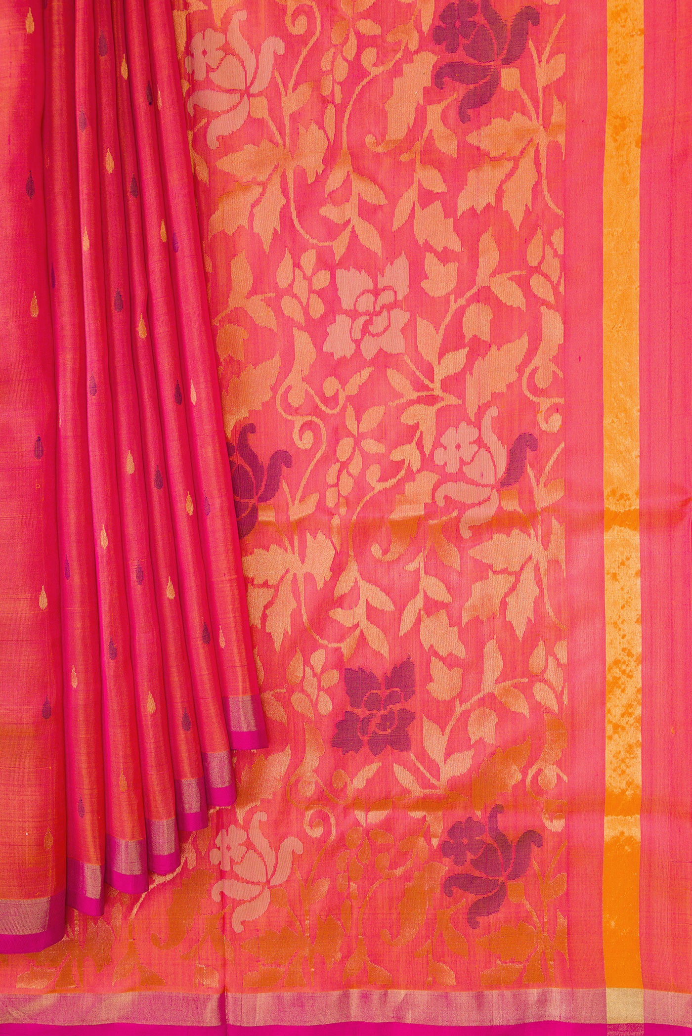 Pleats and pallu of Coral Dual Tone Uppada Silk Saree with Zari And Thread Butta on the body and Zari Border. 