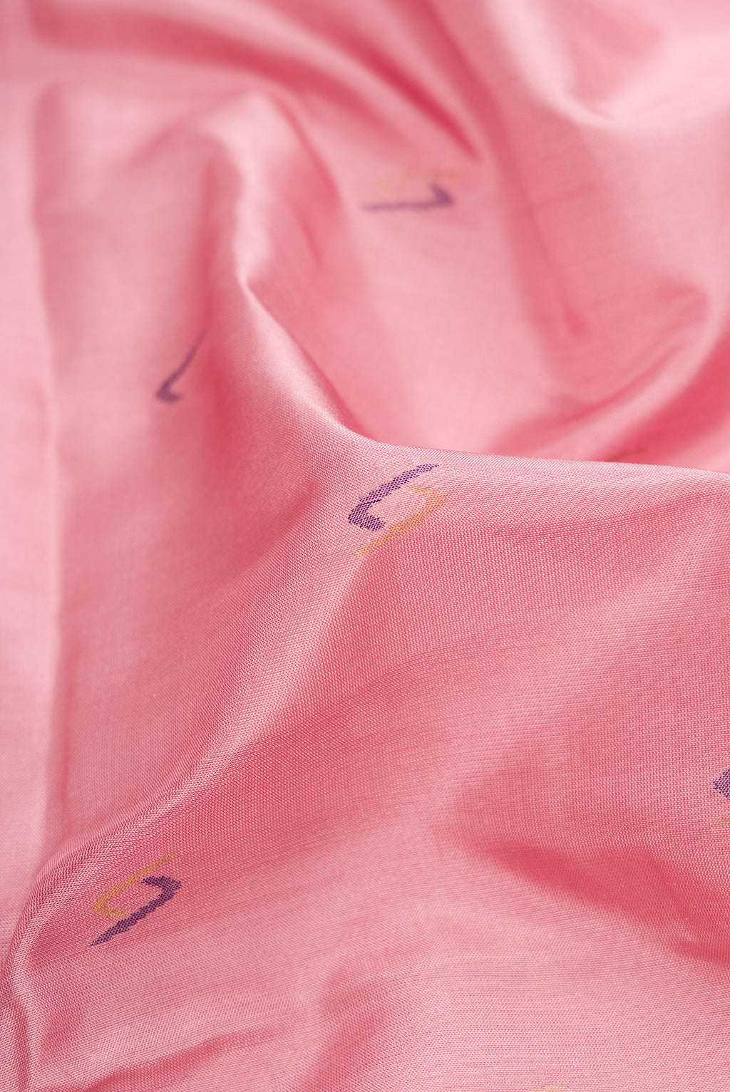 Close up of Pink Dual Tone Uppada Silk Saree with Zari And Thread Butta on the body and Zari Border.  displaying folds