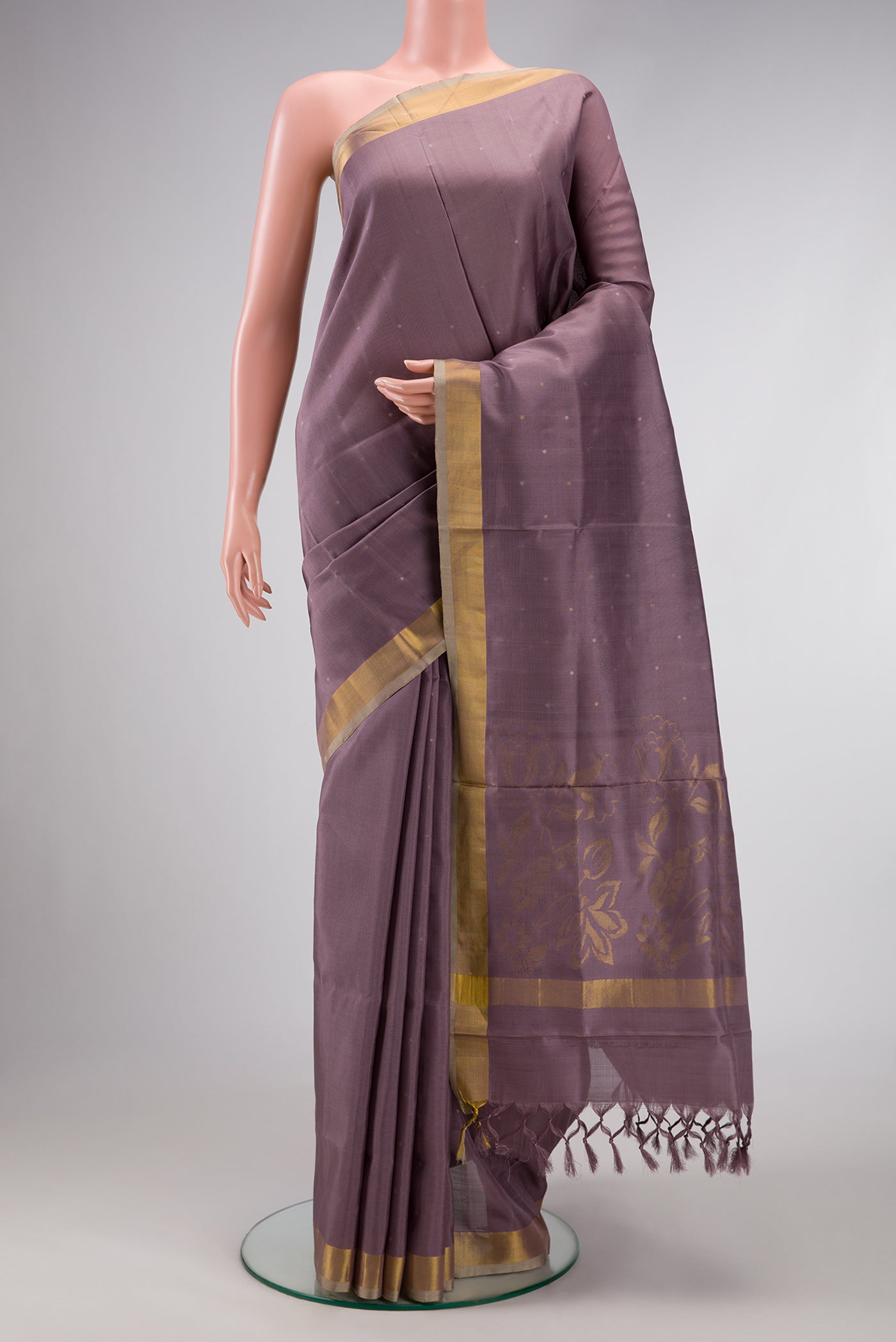 Lavender Dual Tone Uppada Silk Saree with Zari Butta on the body and Zari Border.  displayed on a mannequin