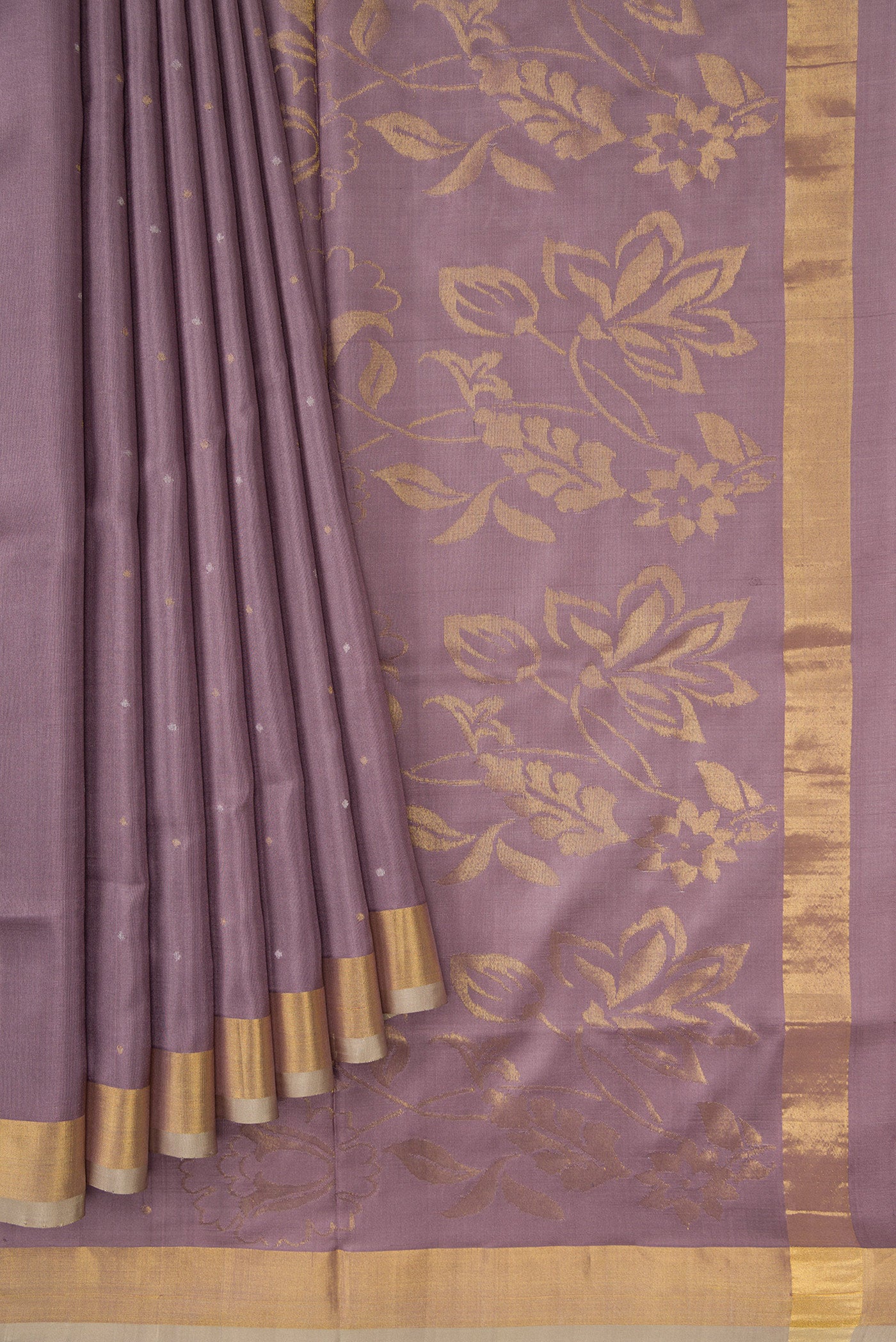 Pleats and pallu of Lavender Dual Tone Uppada Silk Saree with Zari Butta on the body and Zari Border. 