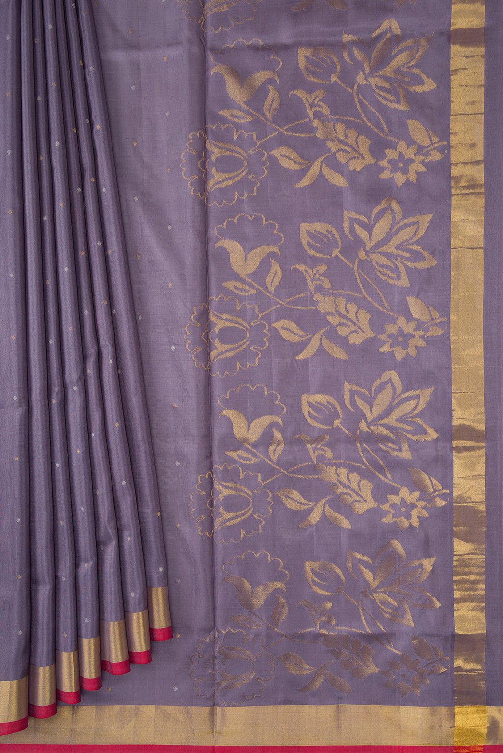 Pleats and pallu of Grey Dual Tone Uppada Silk Saree with Zari Butta on the body and Zari Border. 