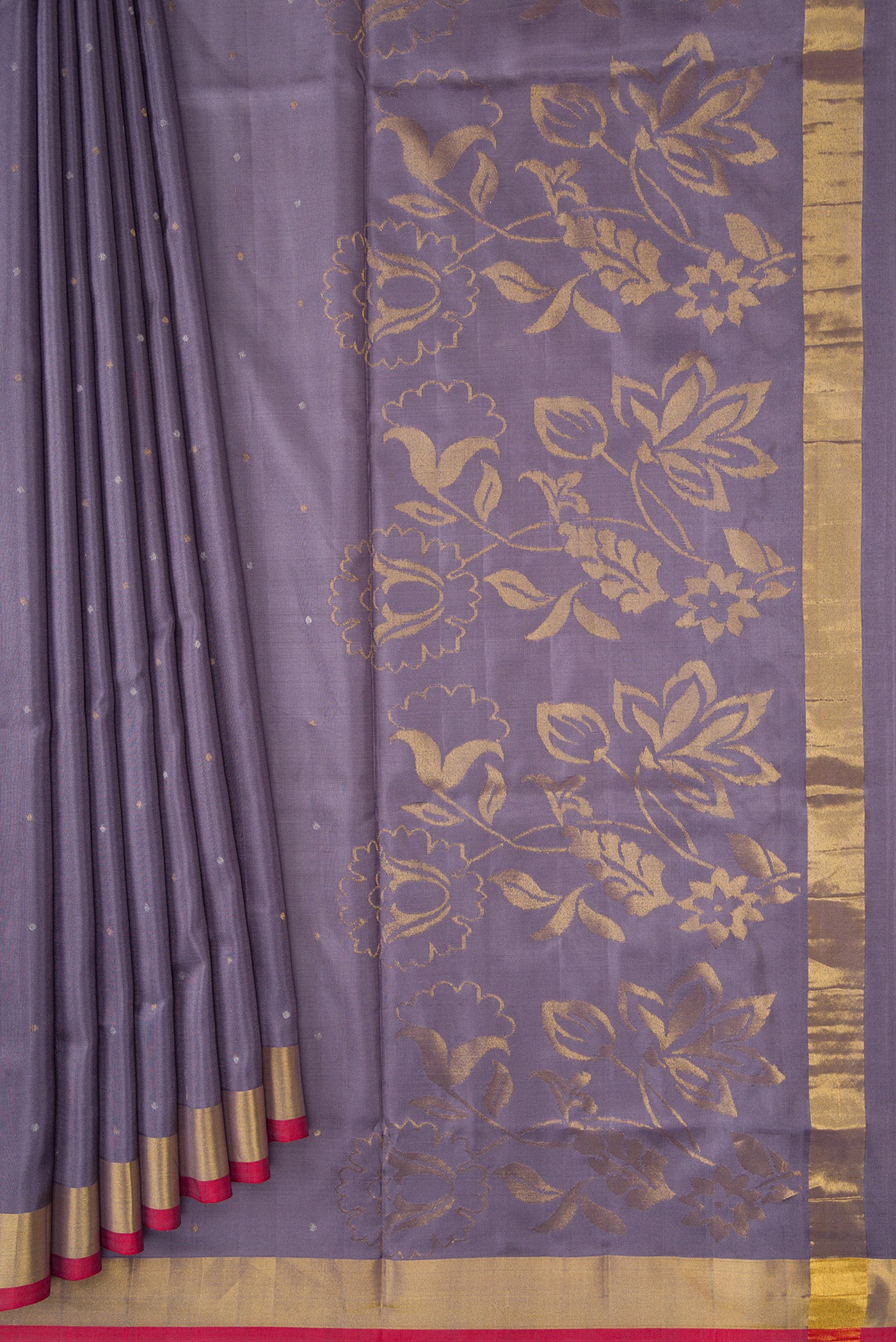 Pleats and pallu of Grey Dual Tone Uppada Silk Saree with Zari Butta on the body and Zari Border. 