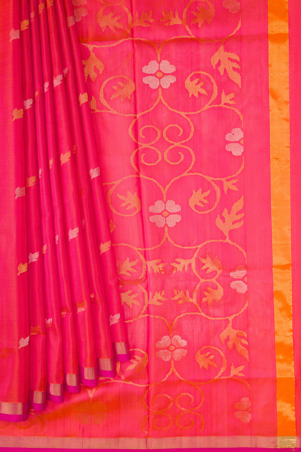 Pleats and pallu of Coral Dual Tone Uppada Silk Saree with Zari Butta on the body and Zari Border. 