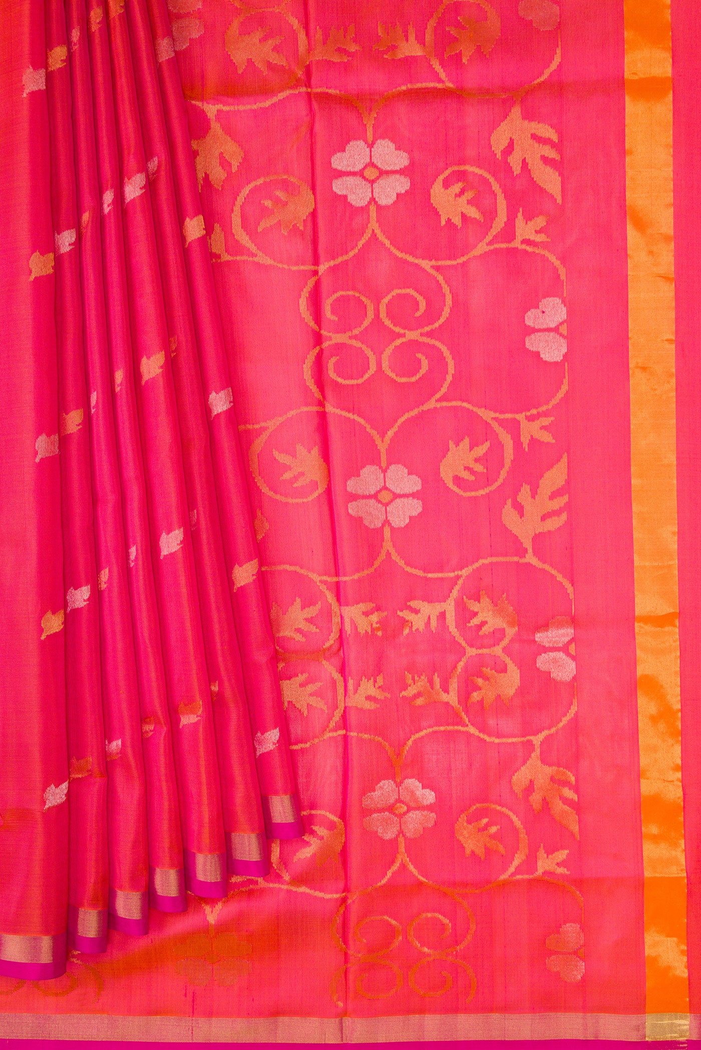 Pleats and pallu of Coral Dual Tone Uppada Silk Saree with Zari Butta on the body and Zari Border. 