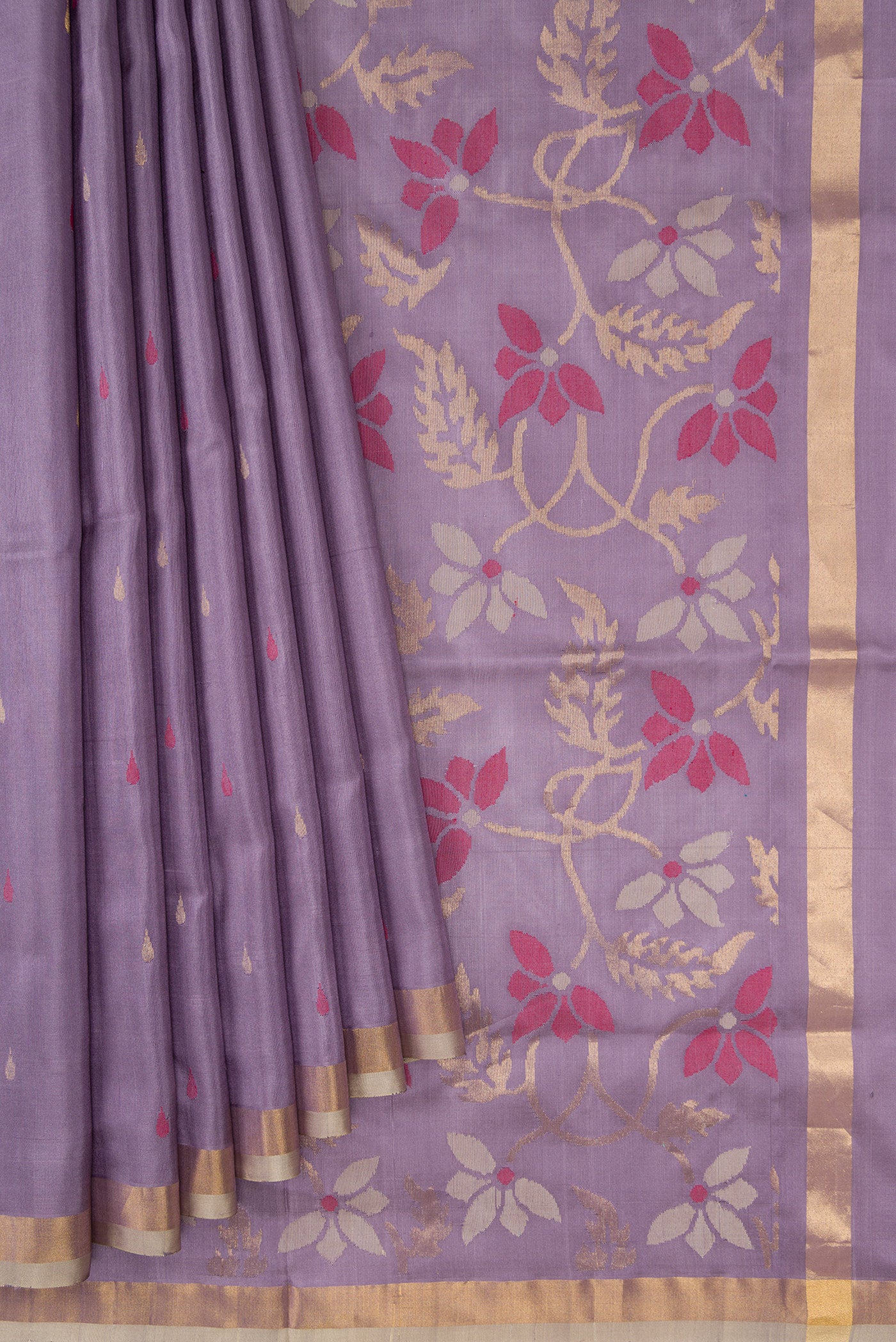 Pleats and pallu of Purple Dual Tone Uppada Silk Saree with Zari And Thread Butta on the body and Zari Border. 