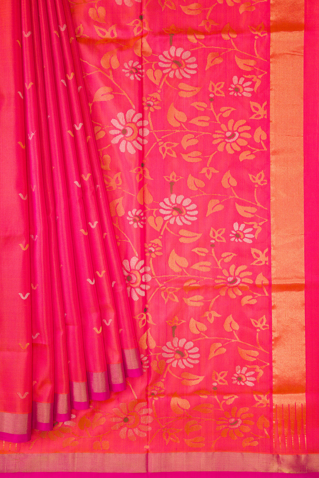 Pleats and pallu of Coral Dual Tone Uppada Silk Saree with Zari Butta on the body and Zari Border. 