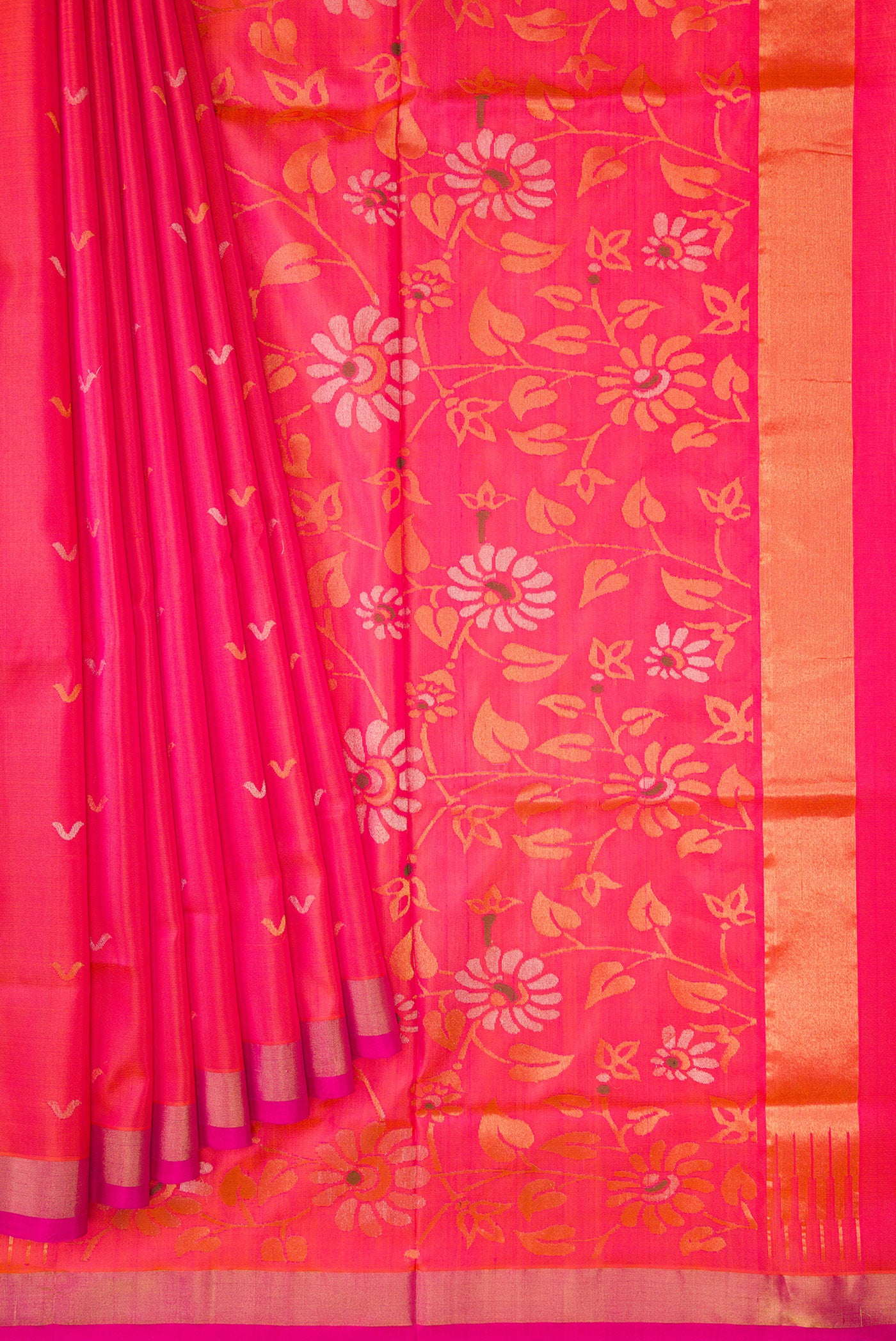 Pleats and pallu of Coral Dual Tone Uppada Silk Saree with Zari Butta on the body and Zari Border. 