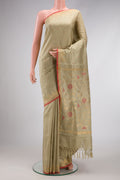 Beige Dual Tone Uppada Silk Saree with Zari And Thread Butta on the body and Temple Border.  displayed on a mannequin