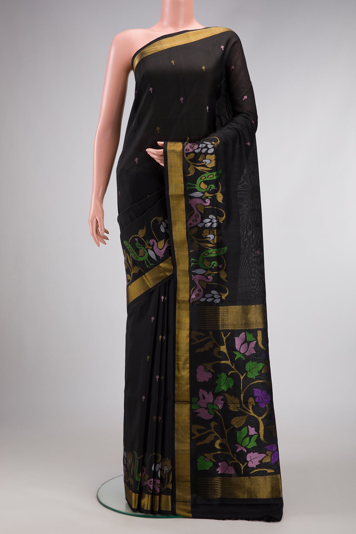 Black Dual Tone Uppada Silk Saree with Zari And Thread Butta on the body and Zari Border.  displayed on a mannequin