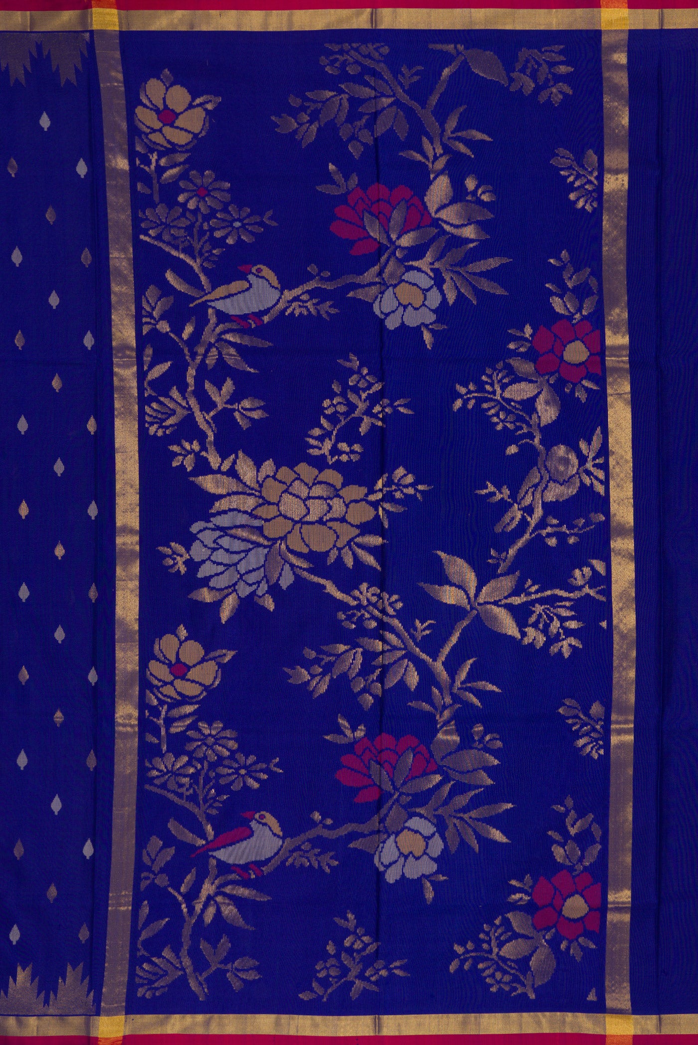 Close up image of the pallu of Navy Blue Dual Tone Uppada Silk Saree with Zari Butta on the body and Temple Border. 