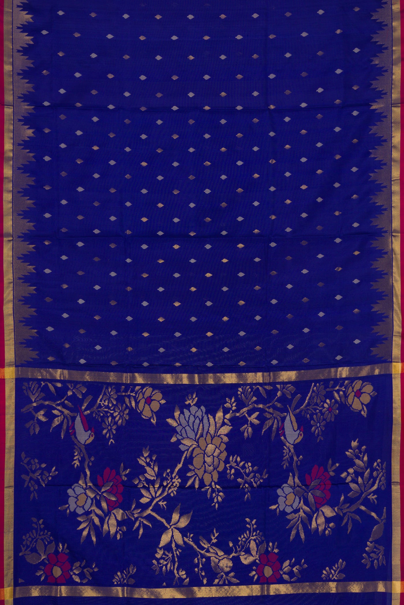 Flat view of Navy Blue Dual Tone Uppada Silk Saree with Zari Butta on the body and Temple Border. 