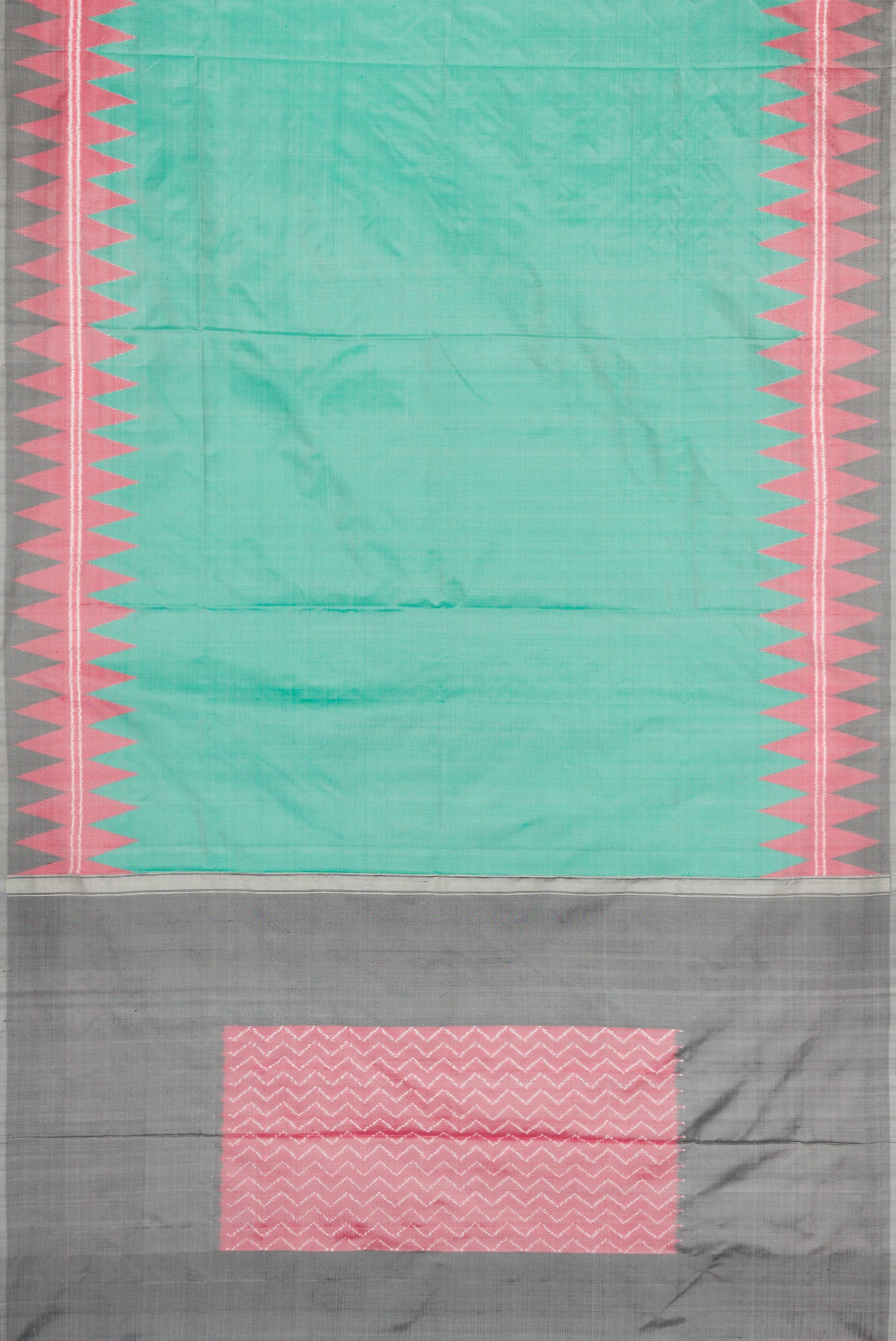 Flat view of Green Dual Tone Double Ikat Saree with Plain Body and Temple Border. 