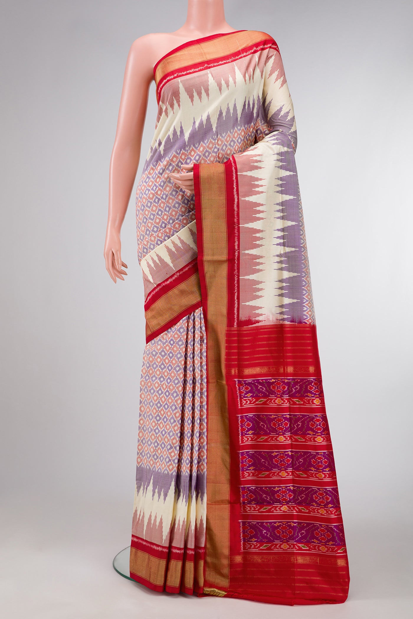 Lilac Dual Tone Double Ikat Saree with Ikat Print on the body and Zari Border.  displayed on a mannequin