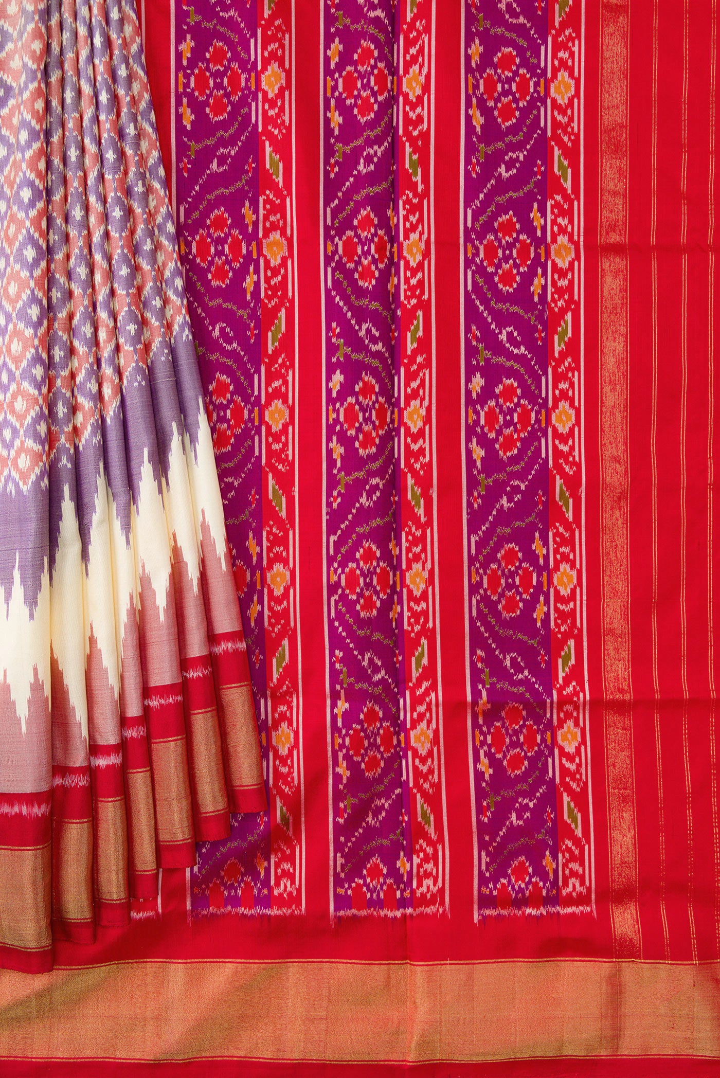 Pleats and pallu of Lilac Dual Tone Double Ikat Saree with Ikat Print on the body and Zari Border. 