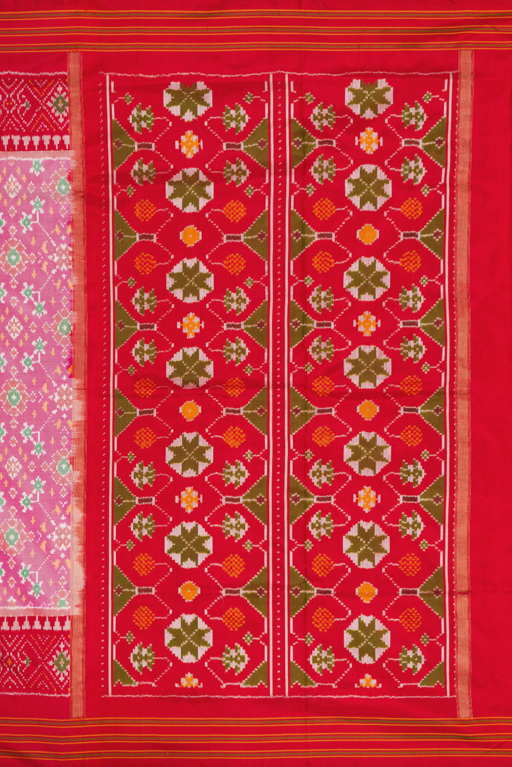 Close up image of the pallu of Pink Dual Tone Double Ikat Saree with Ikat Print on the body and Ikat Border. 