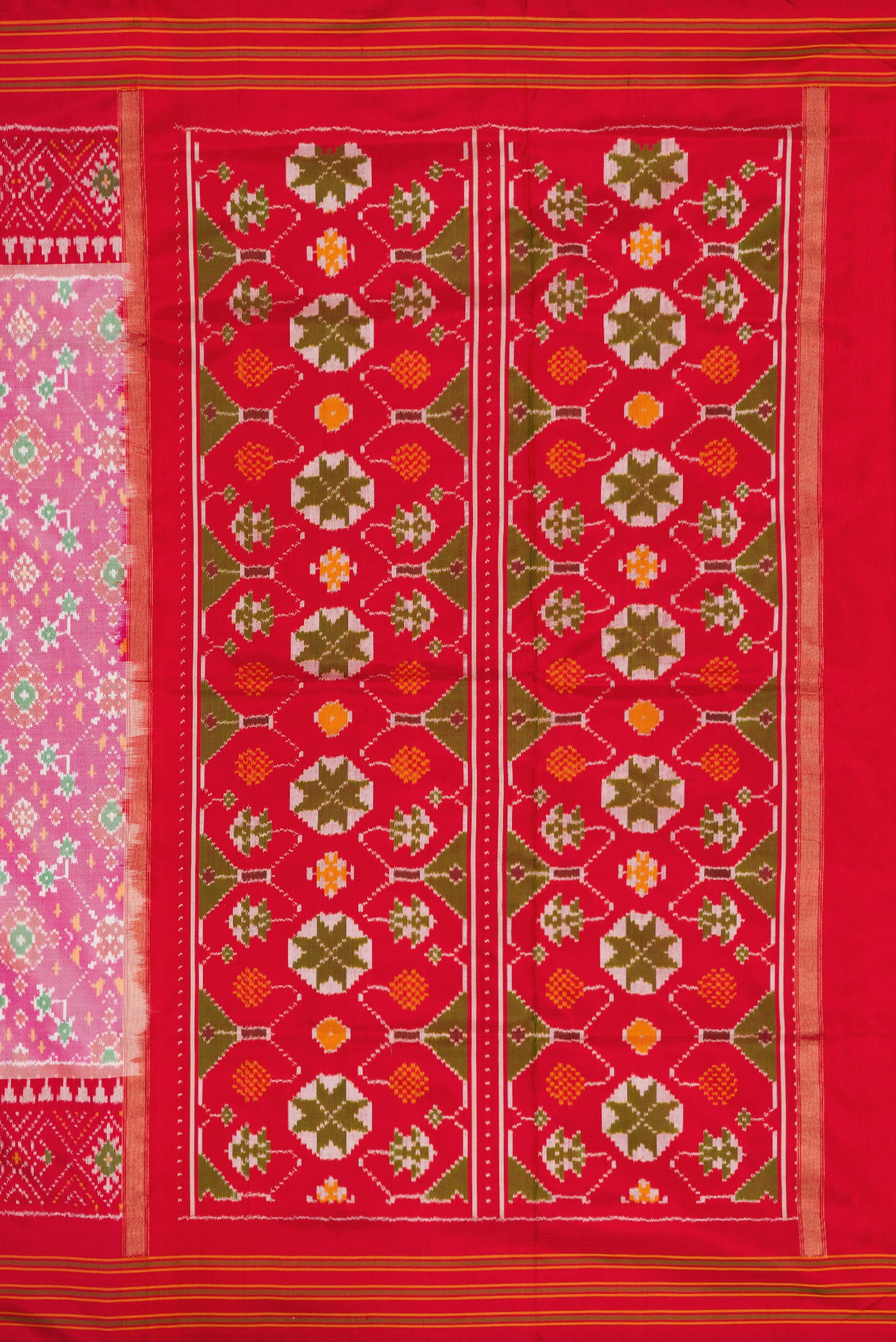 Close up image of the pallu of Pink Dual Tone Double Ikat Saree with Ikat Print on the body and Ikat Border. 