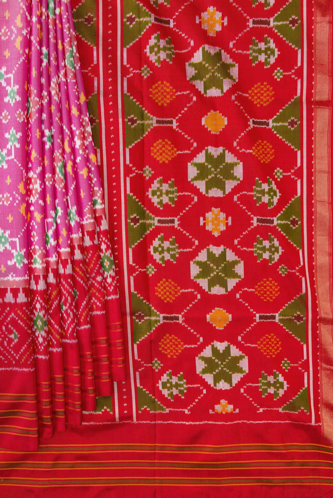 Pleats and pallu of Pink Dual Tone Double Ikat Saree with Ikat Print on the body and Ikat Border. 