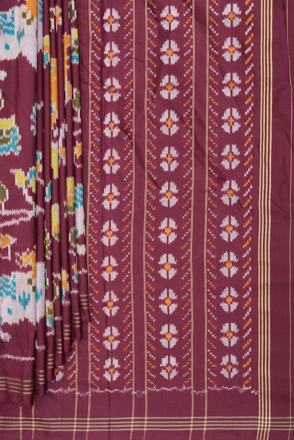Pleats and pallu of Pure Silk Maroon Pochampally Saree with Ikat design on the body and Thread Border. 