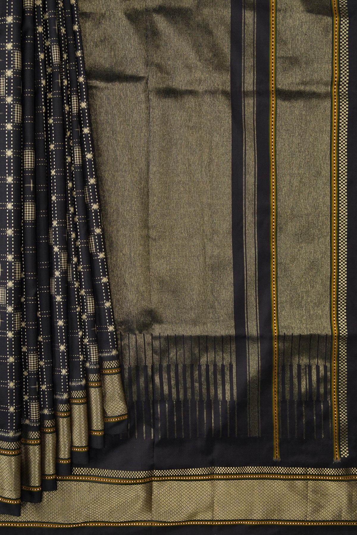Pleats and pallu of Black Dual Tone Banarasi Silk Saree with Zari Butta on the body and Zari Border. 