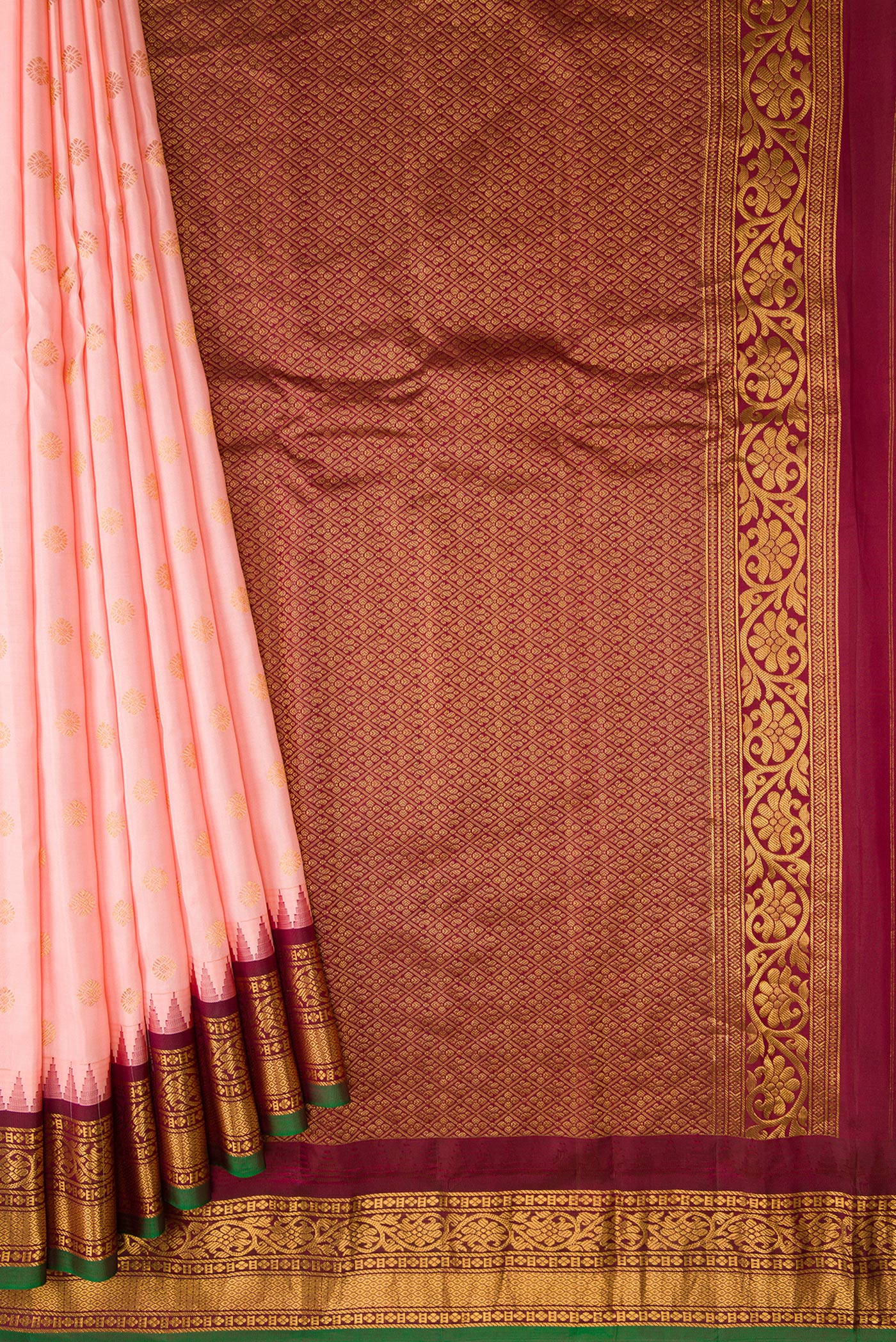 Pleats and pallu of Pink Dual Tone Gadwal Silk Saree with Zari Butta on the body and Zari Border. 