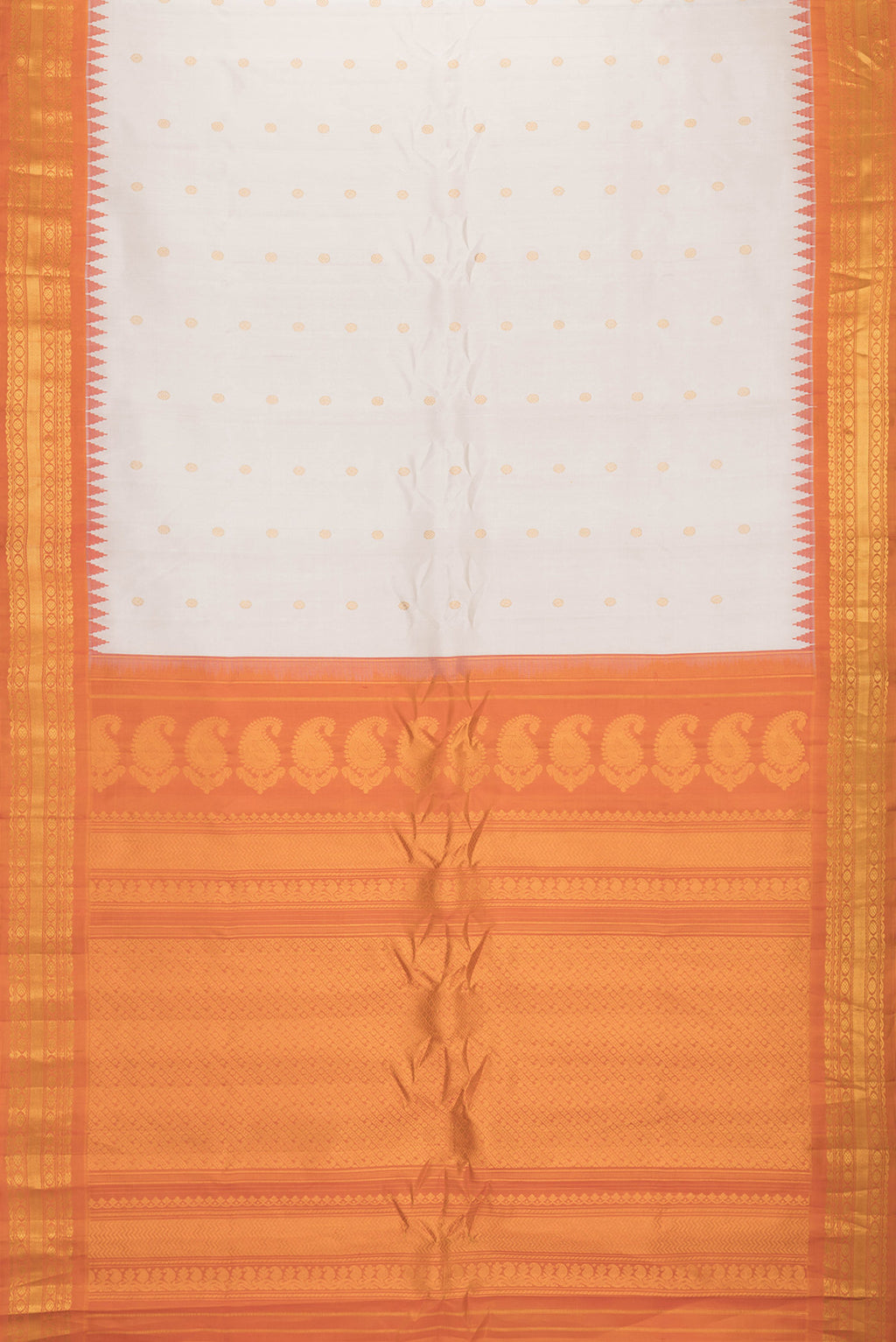Flat view of Beige Dual Tone Gadwal Silk Saree with Zari Butta on the body and Zari Border. 