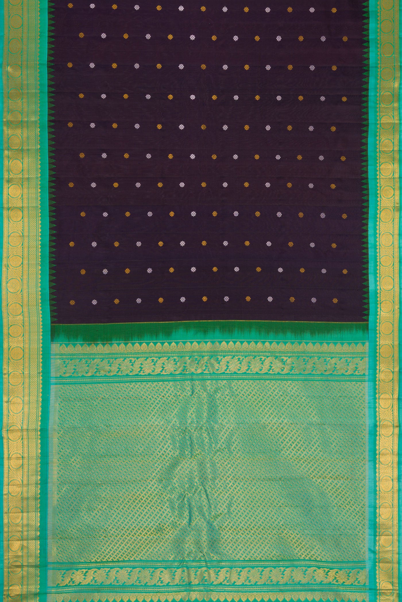 Flat view of Navy Blue Dual Tone Gadwal Silk Saree with Zari And Thread Butta on the body and Zari Border. 